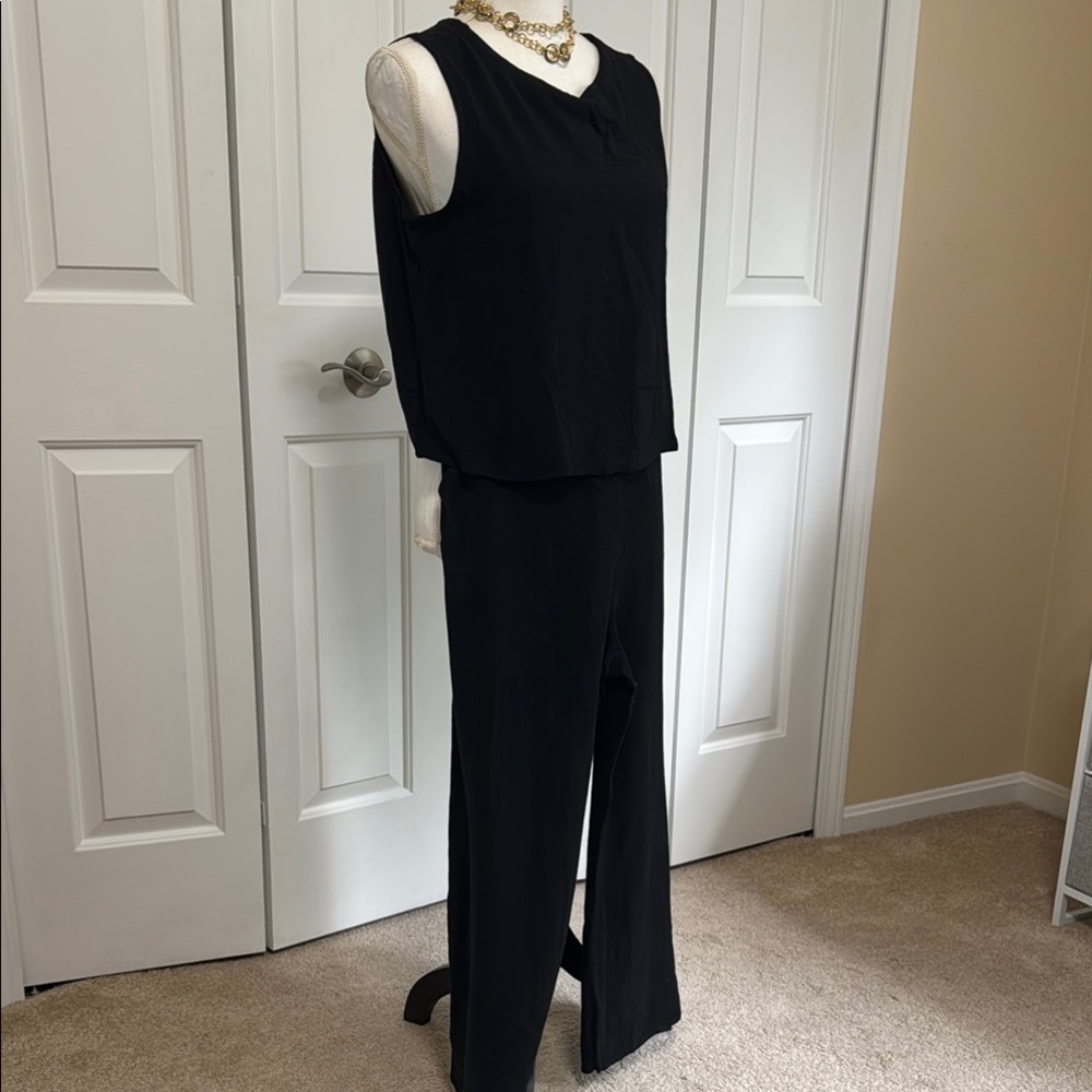 Sleek Black pants and shirt set with buttons on the back
